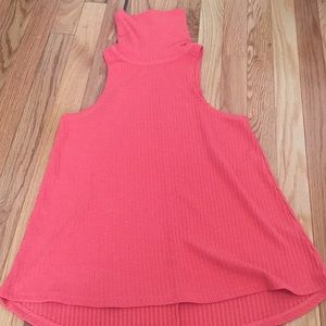 Pink sleeveless turtle neck